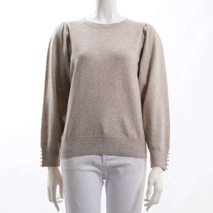 袖口パールボタンパフスリーブニット