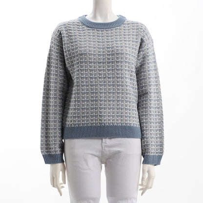 ドロップショルダーのツイードニット