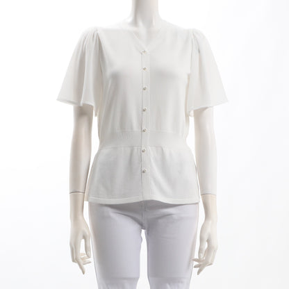 パールボタンペプラムニット