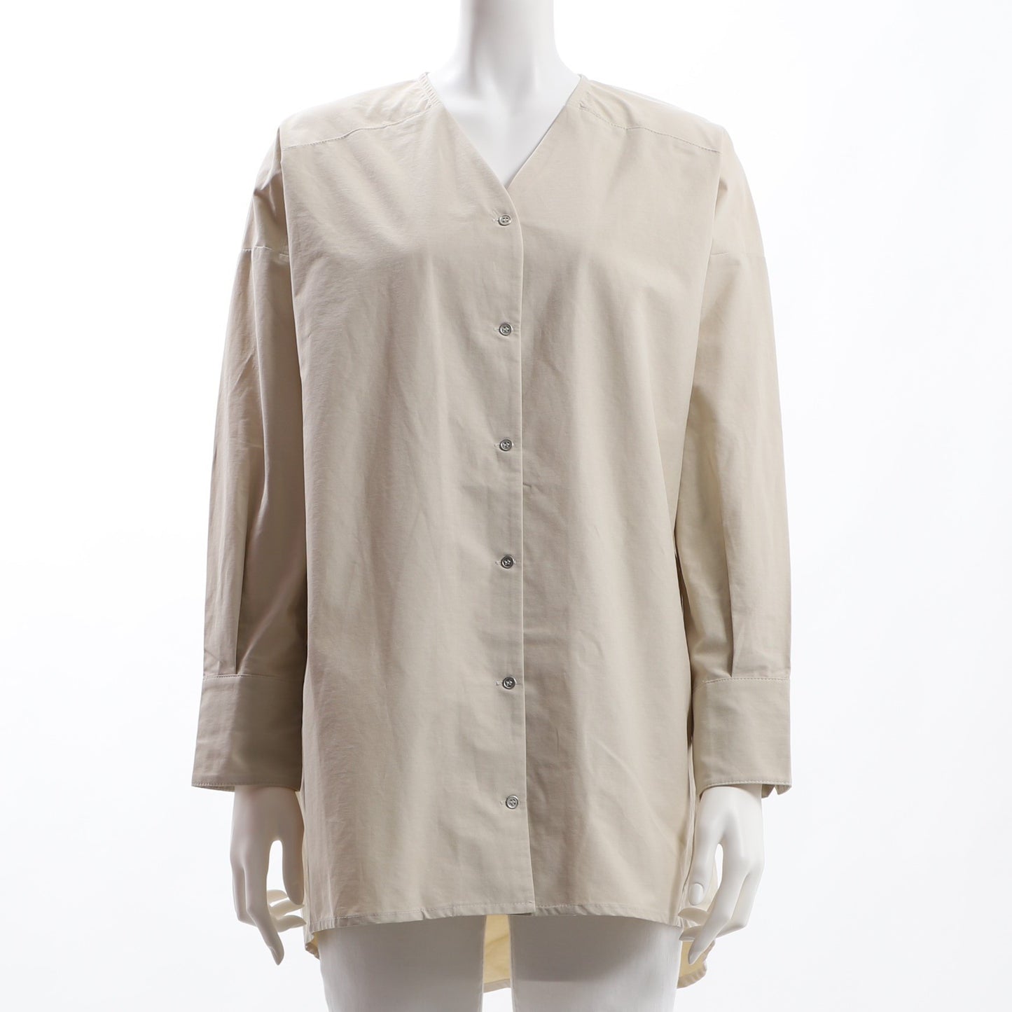 フロントボタンバックテールブラウス