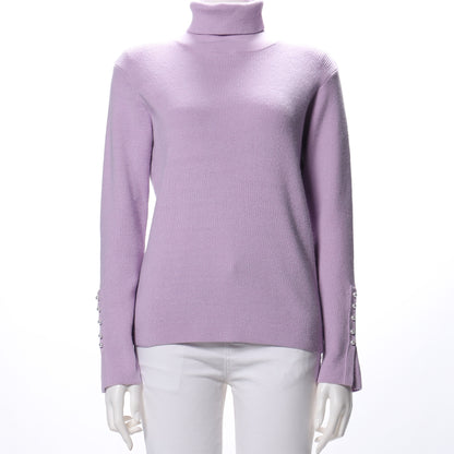 タートルネックパールボタンニット