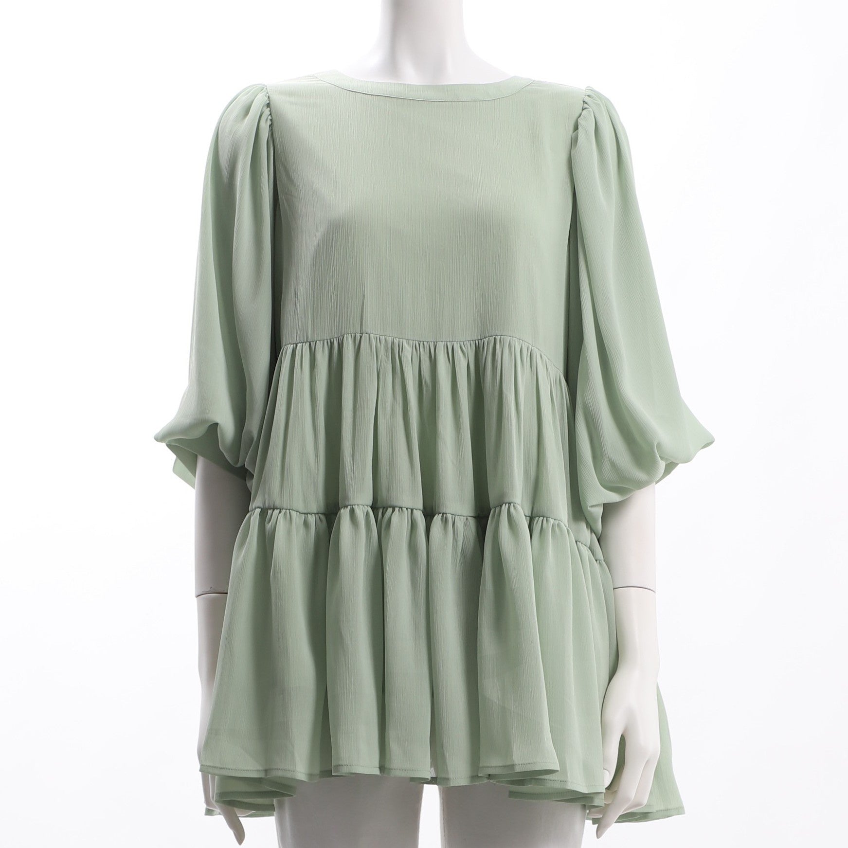 バックボタンティアードブラウス