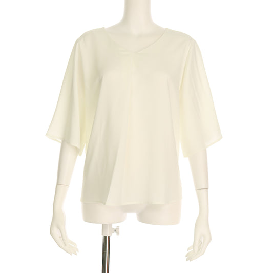 バックねじりシャツ