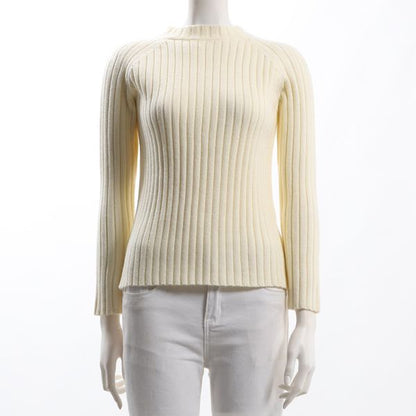 詰まったネックデザインラグランリブニット