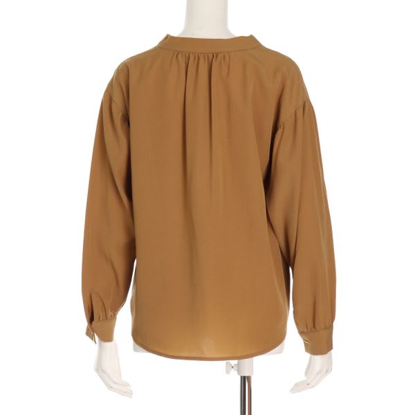 フロント飾りボタンデザインブラウス