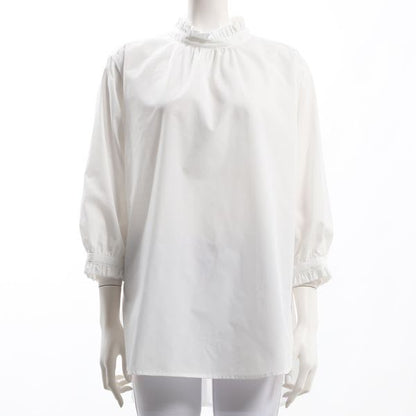 バックボタンフリルネックブラウス