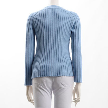 詰まったネックデザインラグランリブニット