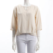 ネックラインメタルパーツブラウス