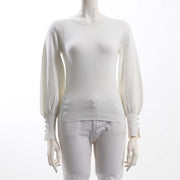 お袖ボタンアクセントクルーネックニット