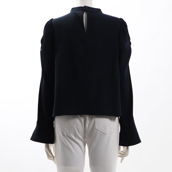 パワーショルダーフリルスタンドカラーブラウス