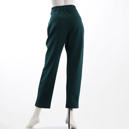 パイピングコードテーパードパンツ