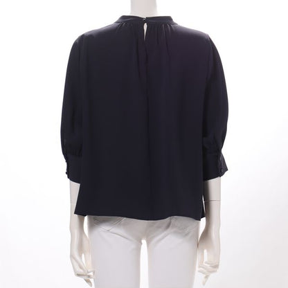 バックボタンスタンドカラーブラウス