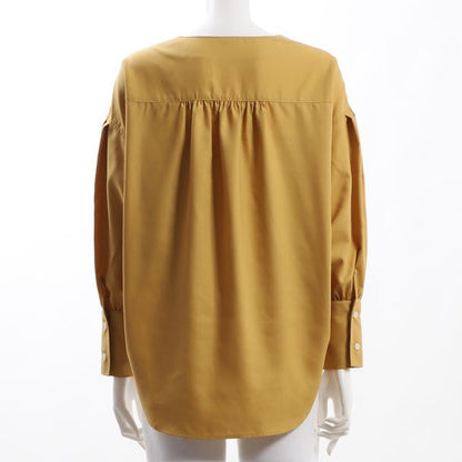 バックテールブラウス