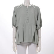 くるみボタンアクセントペプラムブラウス