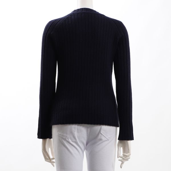 詰まったネックデザインラグランリブニット