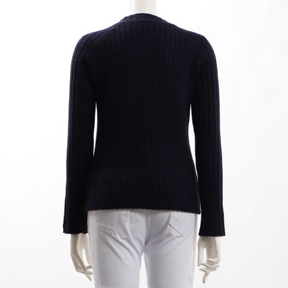 詰まったネックデザインラグランリブニット