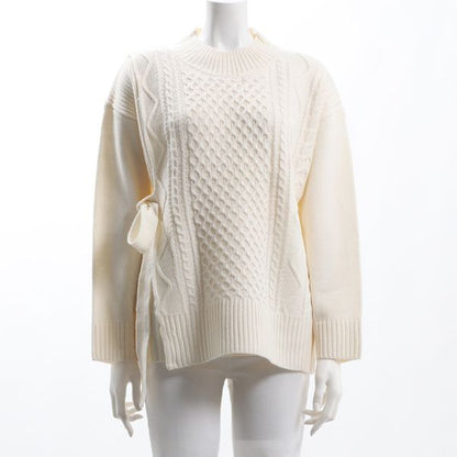 ラップ風ケーブル編みニット