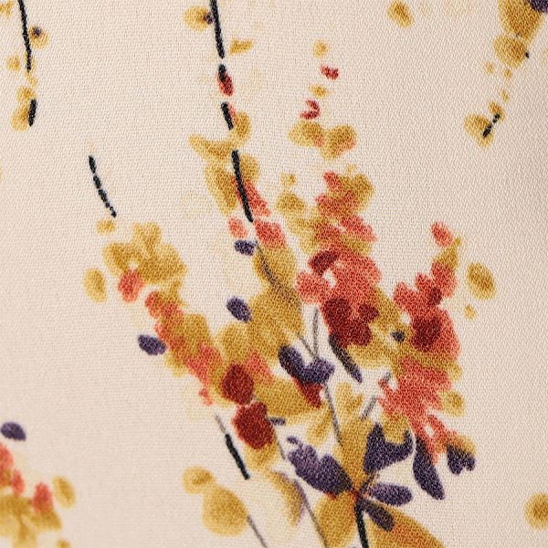 花柄バックボタンブラウス