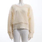 チュール重ね袖ケーブルニット