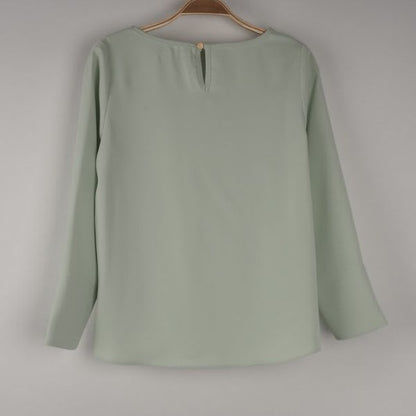 プレート付きダブルクロスブラウス