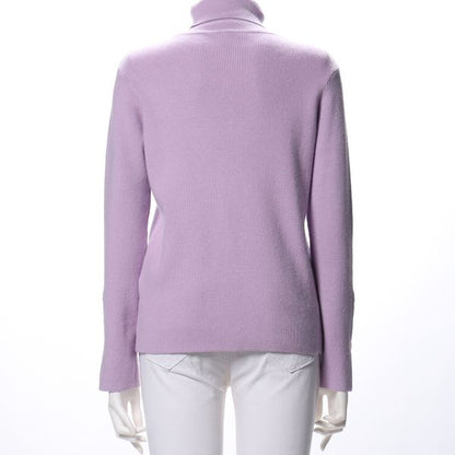 タートルネックパールボタンニット