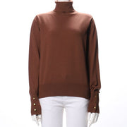 袖金釦タートルネックニット