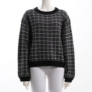 ドロップショルダーのツイードニット