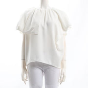 アシンメトリーラッフルブラウス