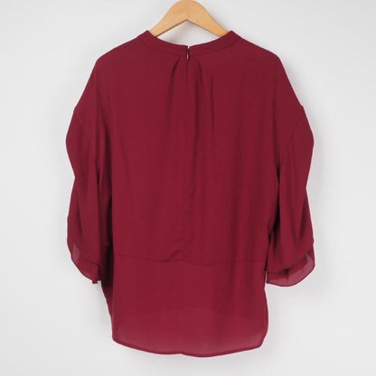 ラッフルデザイン袖ブラウス