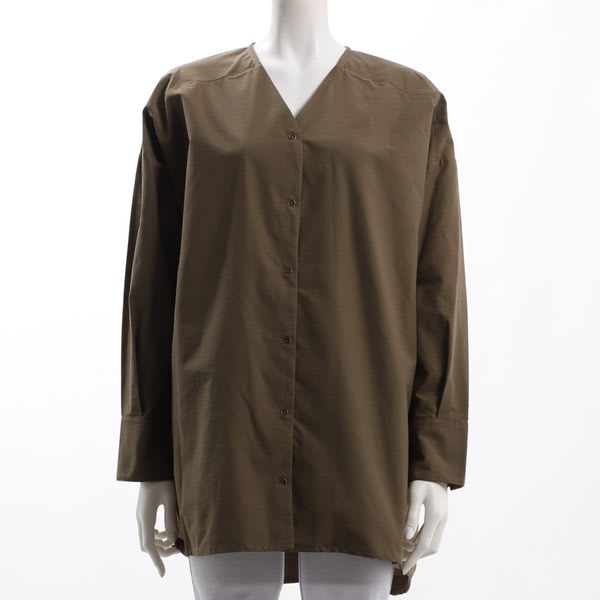 フロントボタンバックテールブラウス