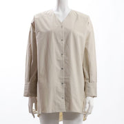 フロントボタンバックテールブラウス