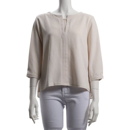 バックデザインメタルパーツカットソー