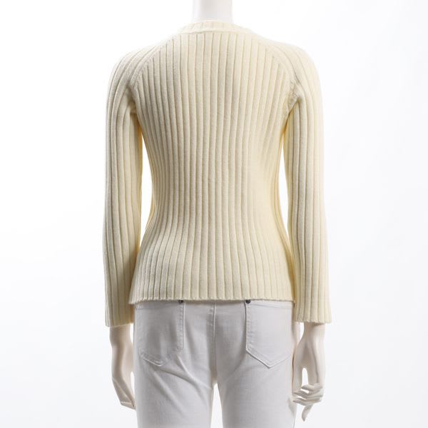 詰まったネックデザインラグランリブニット