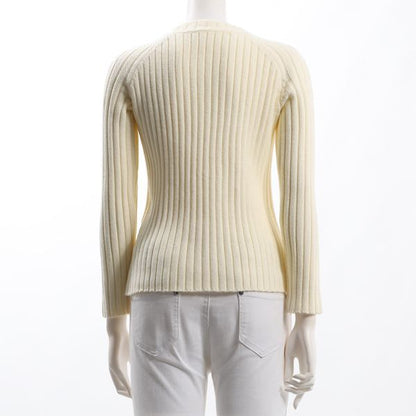 詰まったネックデザインラグランリブニット