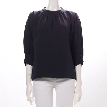 バックボタンスタンドカラーブラウス