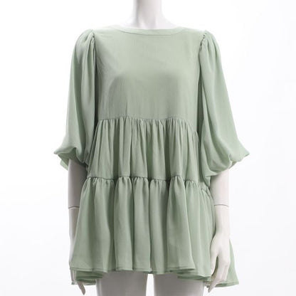 バックボタンティアードブラウス