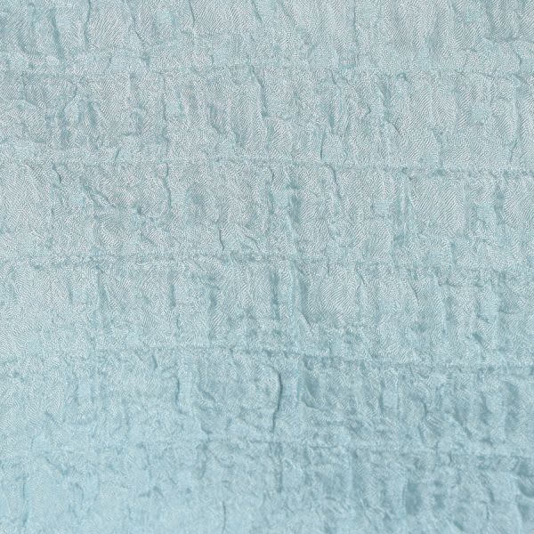 特徴のある表面感のパフスリーブブラウス