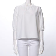 フリルネックブラウス