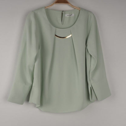 プレート付きダブルクロスブラウス